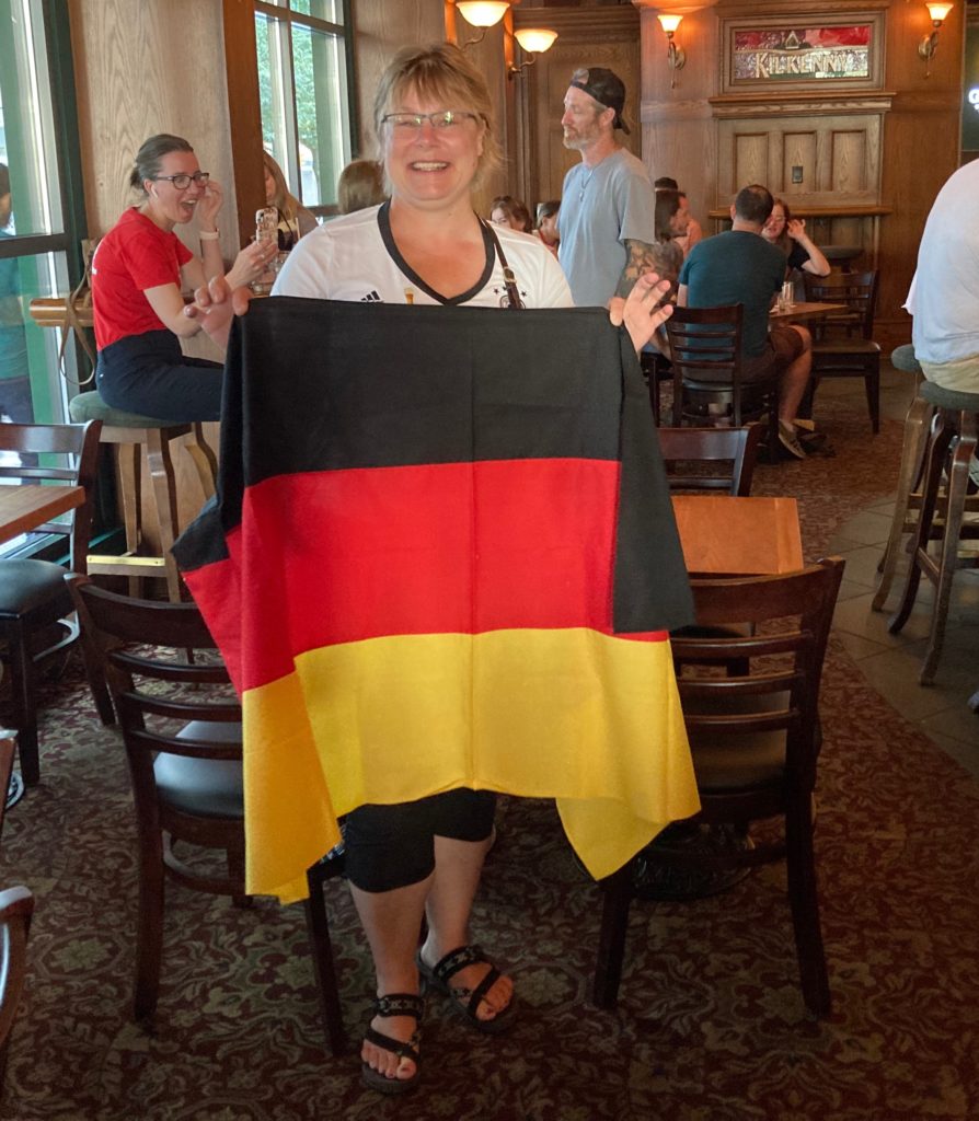 Elke holding German flag alone